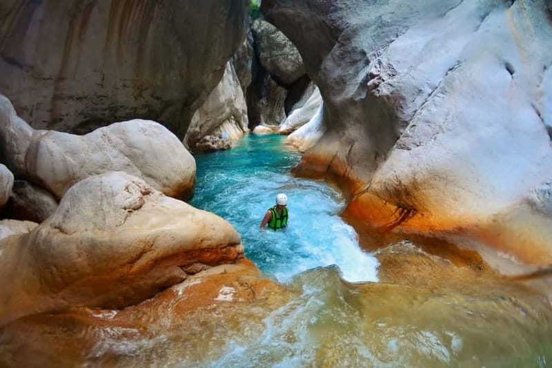 Kemer: Party Bus to Goynuk Canyon with Entrance Ticket - Choosing between canyoning, ziplining, rafting, and a boat ride