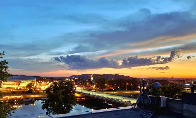 Krakow: Hidden Rooftop Bar Reservation with 1 Cocktail - Live music and the mood after sunset