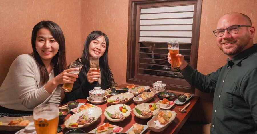 Kyoto: Foodie Night Tour in Gion with 9 dishes + 6 Sake - Starting beneath the Izumo no Okuni statue