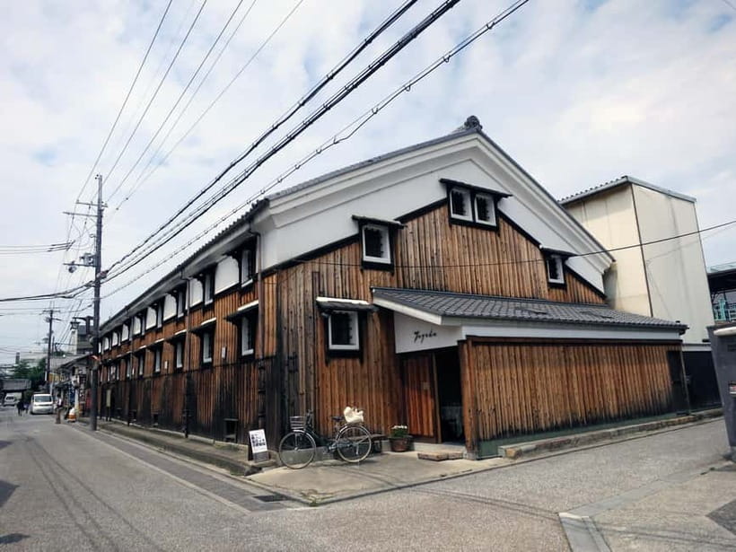 Kyoto: Fushimi Sake District Tour with Boat Ride - Timing, pace, and possible waiting