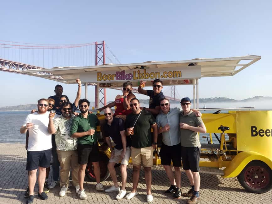 Lisbon: 1-Hour Beer, Sangria or Wine Bike Sightseeing Tour - Seeing the 25 de Abril Bridge from the bike
