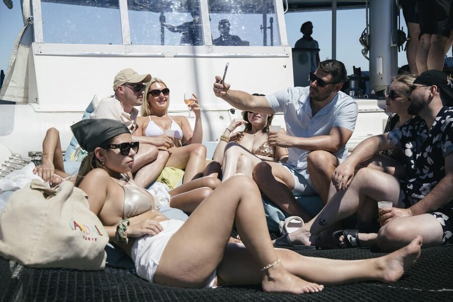 Lisbon: Catamaran Boat Party with Music, Open Bar & Dives - Weather, Cancellations, and Practical Limits