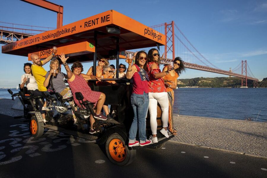 Lisbon: Fun Beer Bike by the Seafront - Under the 25 April Bridge