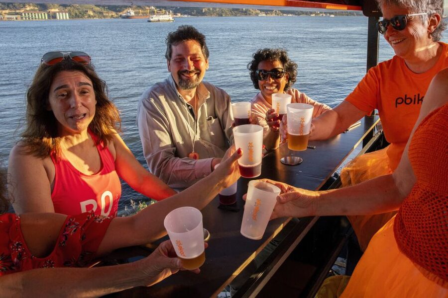 Lisbon: Fun Beer Bike by the Seafront - Drinks, music, and the social side