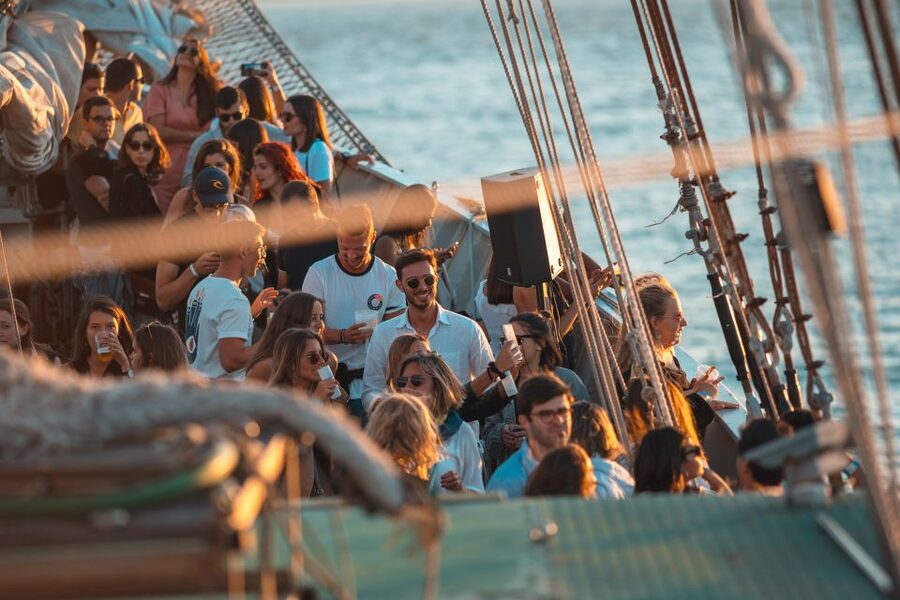 Lisbon: Sunset Boat Party Cruise with Music & Drinks - Christ the King across the Tagus