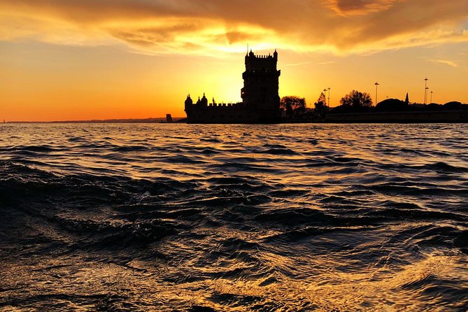 Lisbon: Sunset Cruise With Drinks on Spacious Yacht - Drinks, snacks, and the value of $47