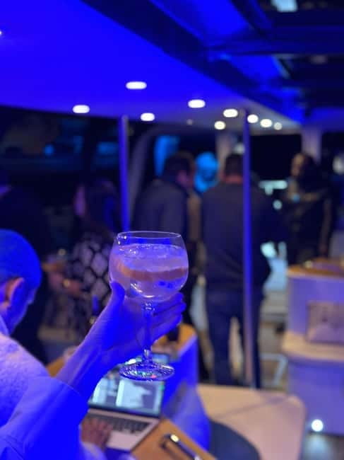 Lisbon: Sunset/Night Boat Party with Open Bar, Snacks & DJ - MAAT and the Tejo Power Station