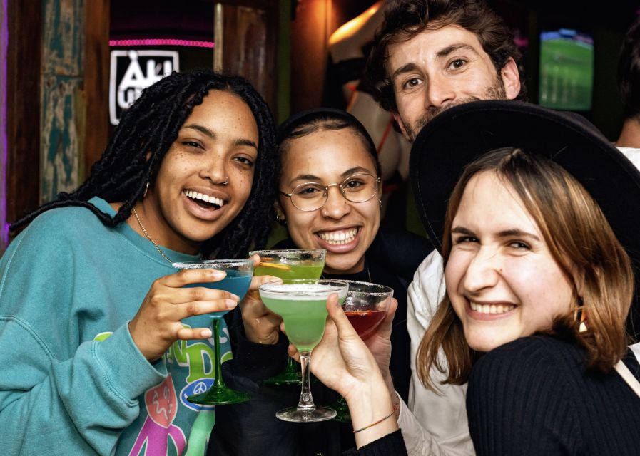 Lisbon: Tipsy Tour Fun Bar Crawl with a Local Guide - Bairro Alto after dark: two hours of stories and stops