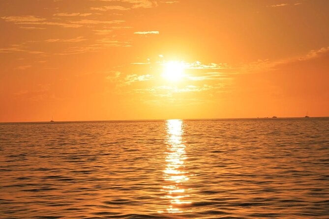 Los Cabos Catamaran Cruise with Open Bar & Light Snack - Lover’s Beach, Divorce Beach, and Cabo’s changing coast