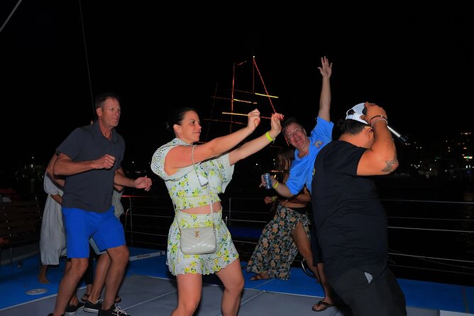 Los Cabos Catamaran Cruise with Open Bar & Light Snack - Music, dancing, and the overall mood