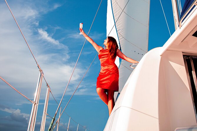 Luxury Sunset Sailing Cruise in Cancun with Light Dinner and Open Bar - Open bar, music, and the mood on board