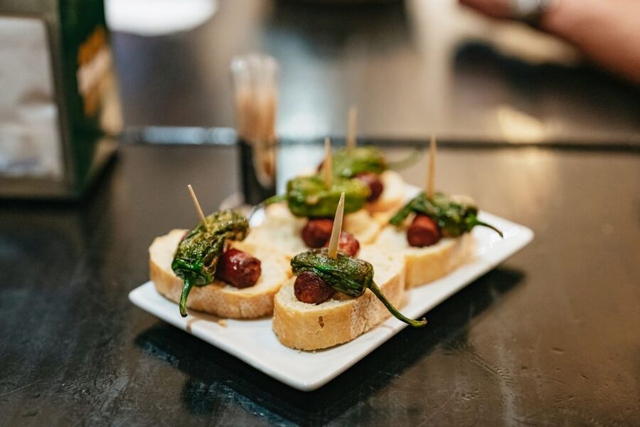 Madrid: Food & Wine Tour with 10 Tapas & 4 Drinks Included - Four stops that make this Madrid food tour different