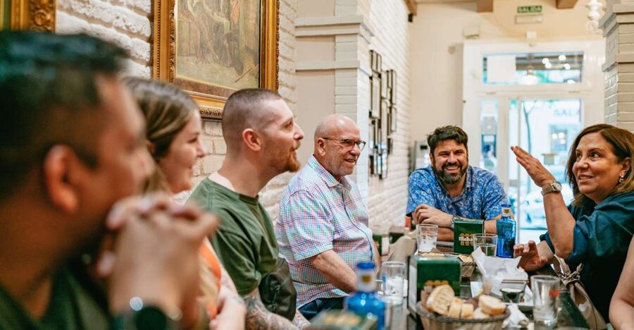 Madrid: Food & Wine Tour with 10 Tapas & 4 Drinks Included - Stop two: a neighborhood bar with local character