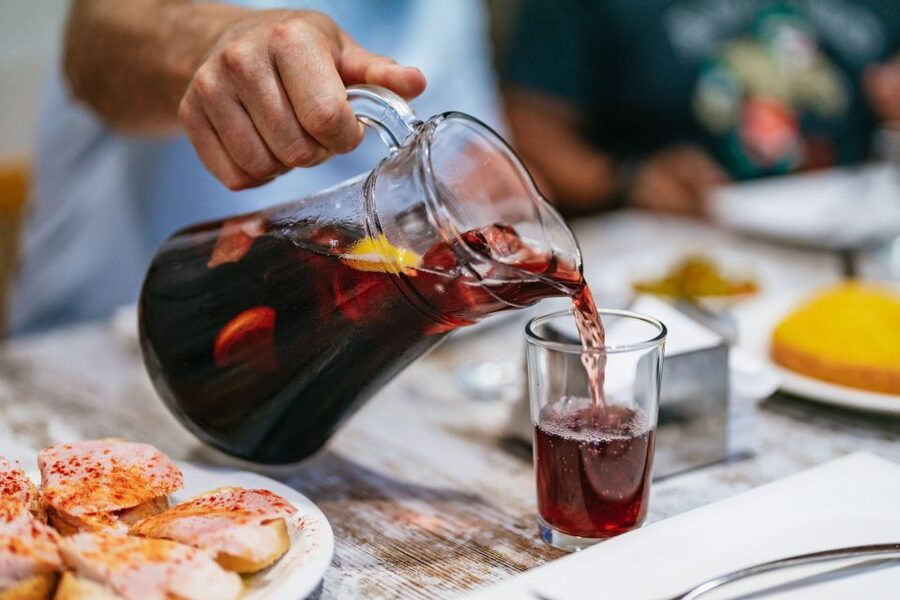 Madrid: Food & Wine Tour with 10 Tapas & 4 Drinks Included - Walking, timing, and the social mood