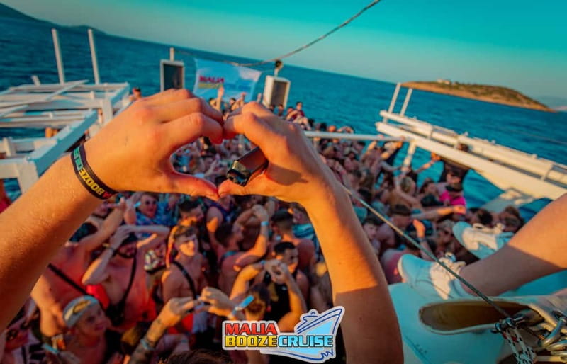 Malia: Booze Cruise Boat Party with Live Dj - Four hours of music, games, and sunset views