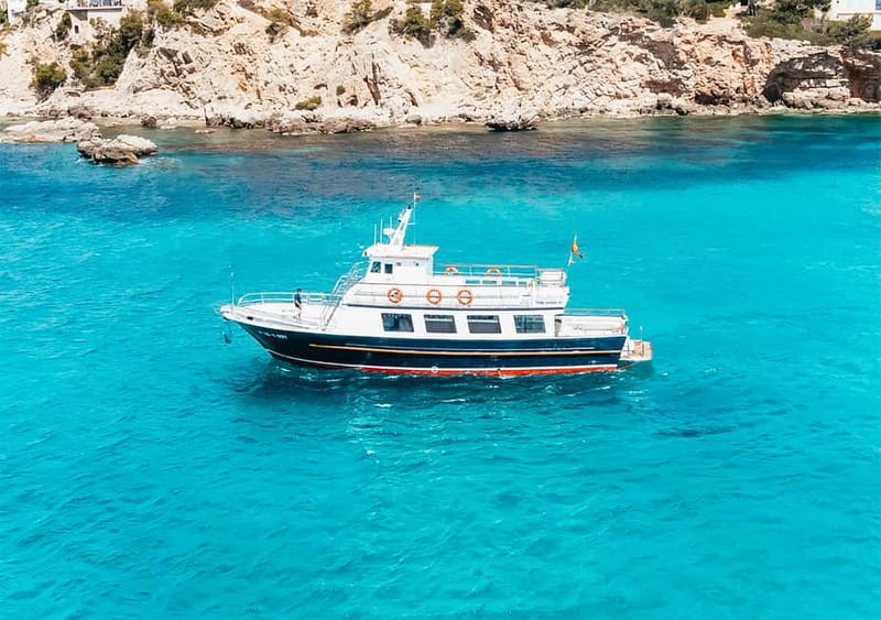 Mallorca: Palma Boat Tour & Snorkeling with Drink Included - Drinks, music, and the onboard atmosphere