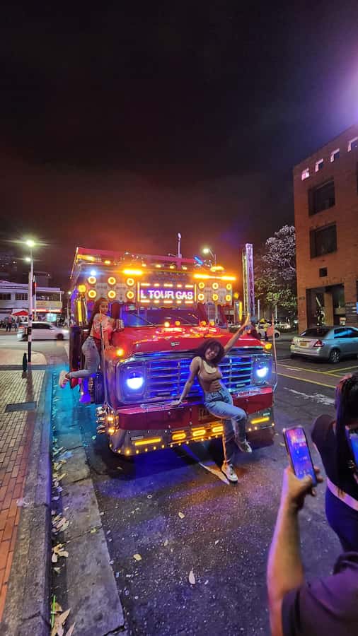 Medellin: Party Bus with DJ & Street Food Tastings - Meeting in El Poblado at Calle 9