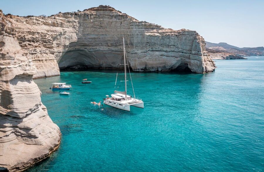 Milos: Full Day Luxury Catamaran with Full Meal & Open Bar - Starting at Adamantas Port with coffee and calm