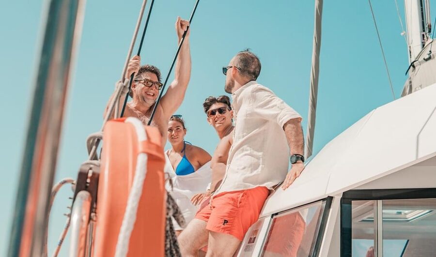 Milos: Full Day Luxury Catamaran with Full Meal & Open Bar - What the crew adds to the day