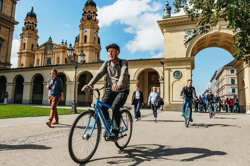 Munich: Guided City Tour by Bike with Beer Garden Stop - Starting beneath Munich’s Old Town Hall clock