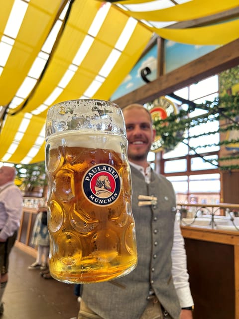 Munich: Guided Oktoberfest Experience with Beer and Lunch - Walking into the Wiesn