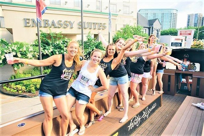 Nashville's Wildest Honky Tonk Public Party Bus (21+) - Downtown Nashville from a lit-up bus