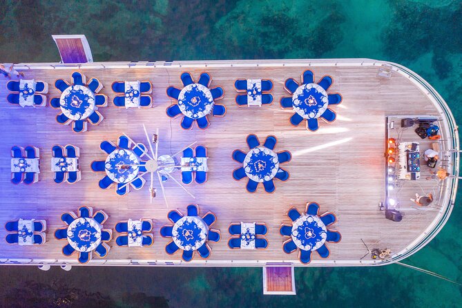 Ocean Vision: Show & Dance Night with buffet, open bar & transfer - Drinks, table service, and the local-brand catch