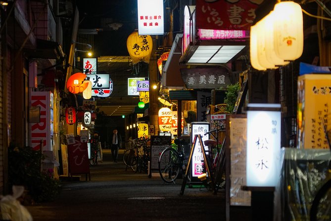 Osaka Bar Hopping Night Walking Tour in Namba (3 bars, 6 tastes) - Hozenji Temple offers a quiet pause