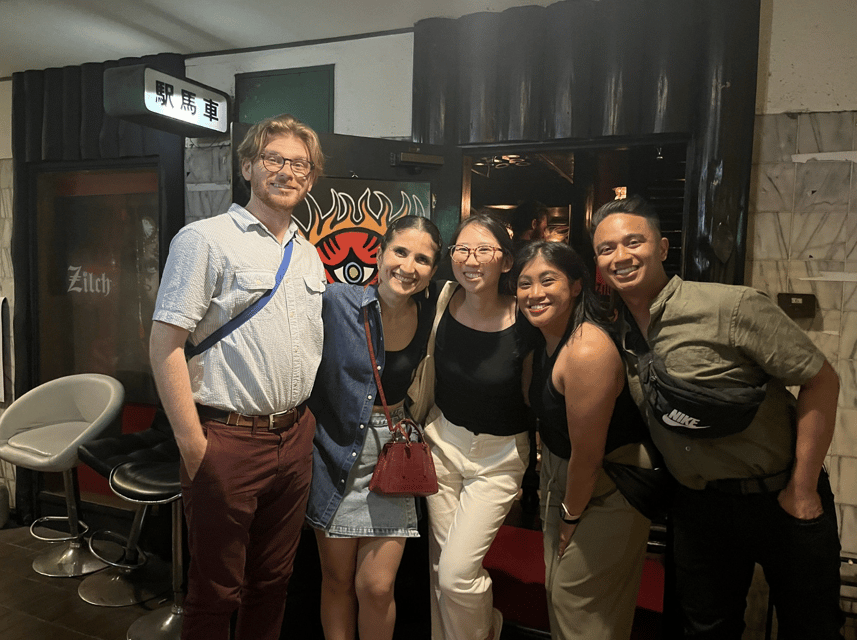 Osaka: Izakaya Bars Guided Walking Tour - Meeting beneath the Glico sign in Dotombori