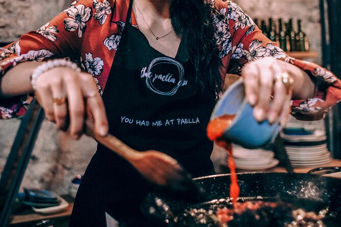 Paella Experience and Bottomless Wine in Barcelona - Bottomless Catalan wine and a lively room