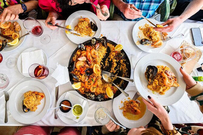 Paella Workshop with Bottomless Sangria in Central Madrid - Preparing chicken and seafood paella together