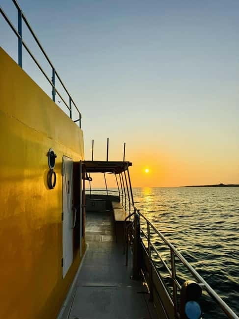 Paphos: Sunset Cruise, Turtle Watching, & Unlimited Drinks - Seeing the Vera K shipwreck through the windows