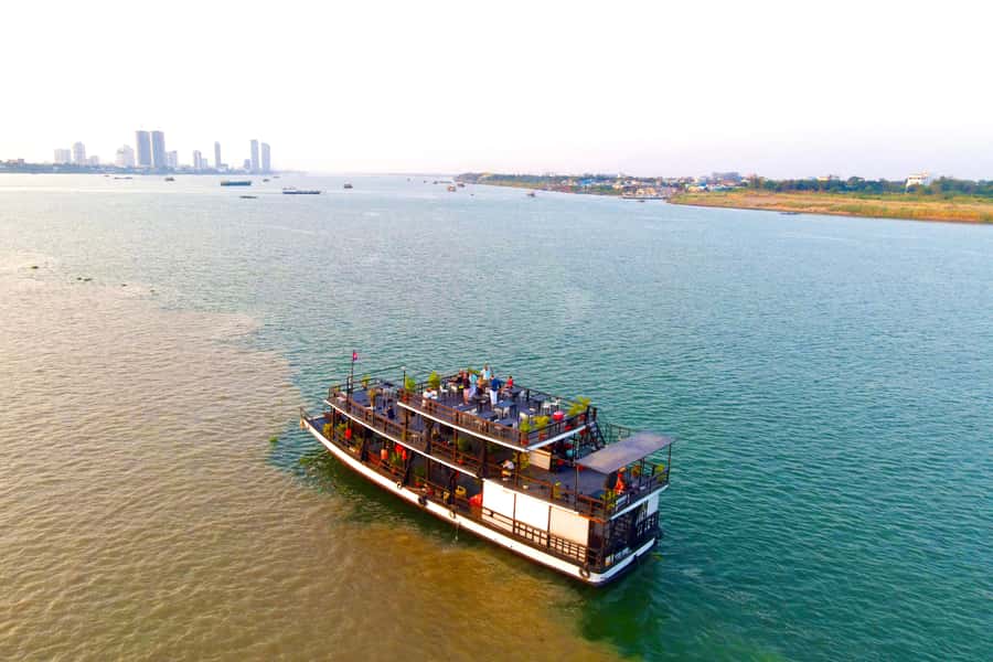 Phnom Penh: Sunset Cruise with Unlimited Beer &Fruit platter - The first 40 minutes: bridges, monuments, and river geography