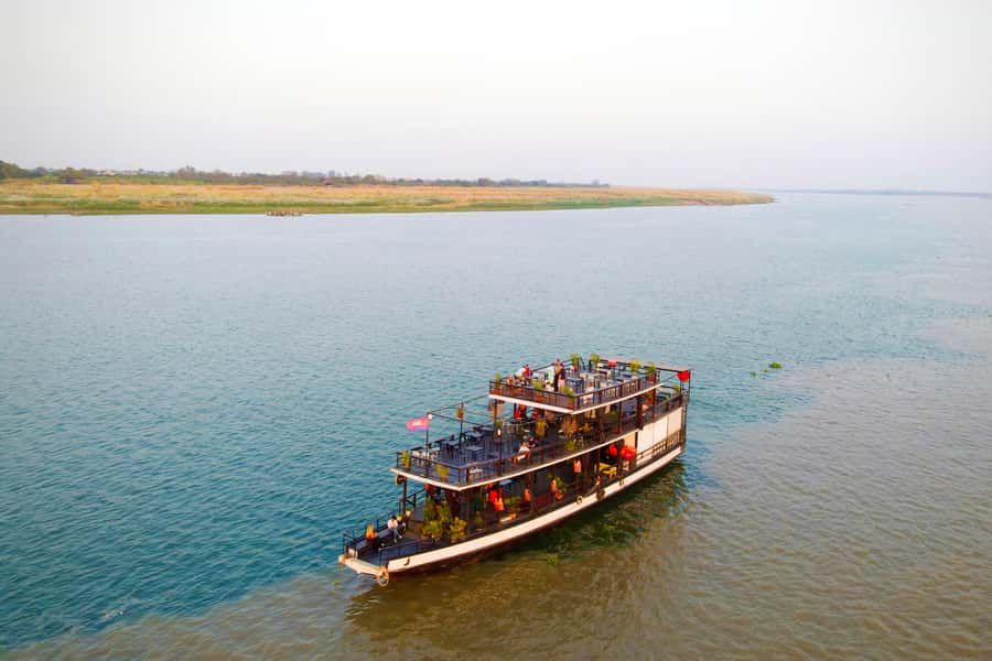 Phnom Penh: Sunset Cruise with Unlimited Beer &Fruit platter - Seeing the Four Faces River from the boat