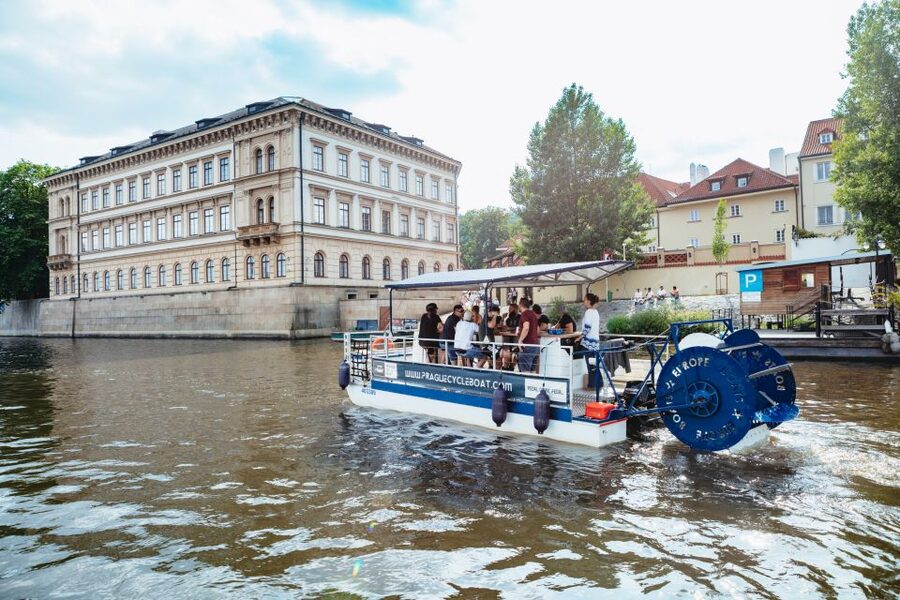 Prague: Swimming Beer Bike on A Cycle Boat - From the National Theater toward Prague’s famous bridges