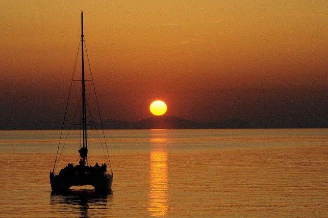 Premium Small-Group Catamaran Cruise with BBQ, Open Bar, Transfer - Red Beach, White Beach, and the southern coast