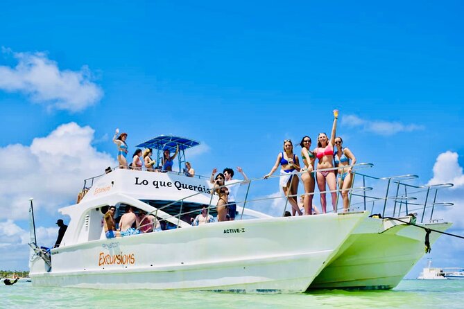 Private Catamaran Cruise with Slide & unlimited drinks - Music, photography, and the party mood