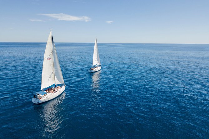 Private Luxury Sailing Cruise in Los Cabos with Lunch and Open Bar - Swimming, snorkeling, and paddleboarding in the bay