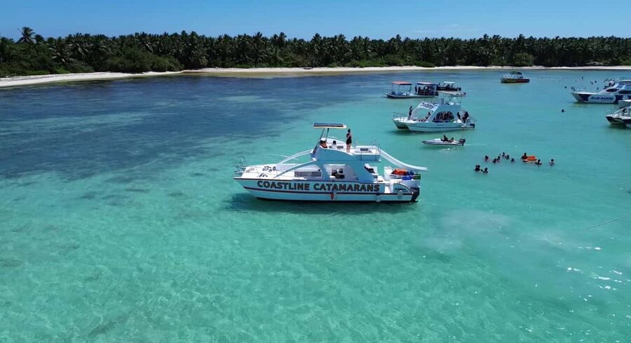 Private Party Boat Tour with Drinks and Snacks in Punta Cana - Boarding the double-decker catamaran