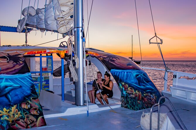 Private Sunset Catamaran Adventure Cruise with Open Bar - Drinks, snacks, and Caribbean music