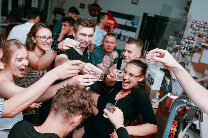 Pub Crawl + Unlimited Drinks + VIP entry + Drinking Games & Photographer - The first stop: an open bar with a hostel feel