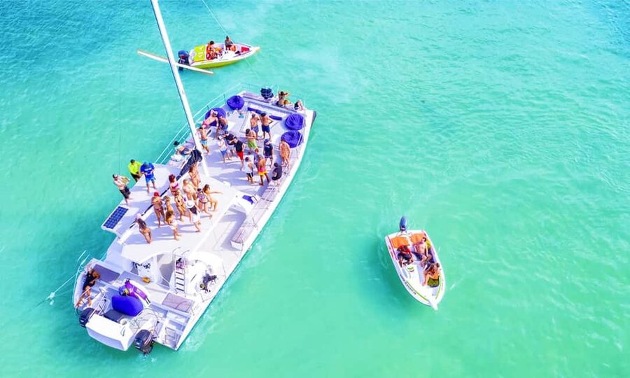 Punta Cana Area: Party Cruise with Parasailing and Open Bar - Parasailing Above the Punta Cana Water
