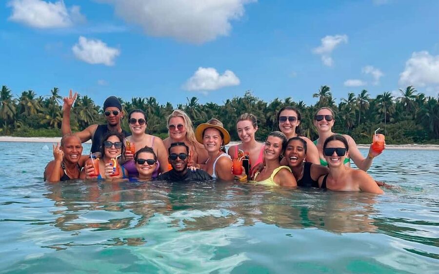 Punta Cana: Booze Cruise with Snorkel and Natural Pool Stop - Food, drinks, music, and crew service