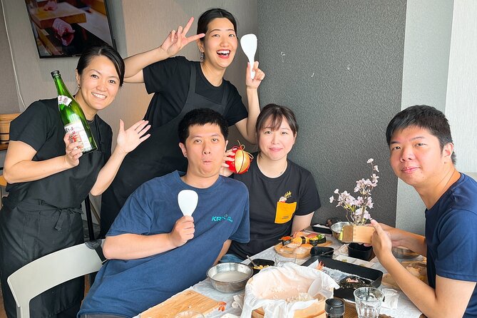 Ramen and Sushi Cooking Class with Sake Pairing Set in Tokyo - Preparing ramen broth and building the bowl