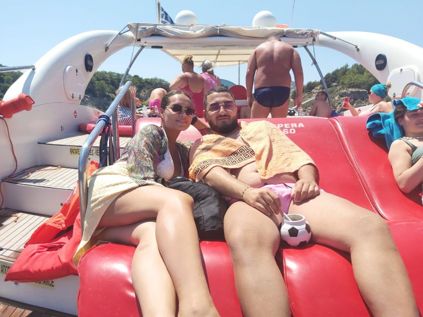 Rhodes: Beach Cruise with Swimming, Meal, & Unlimited Drinks - Lunch, drinks, and the social mood
