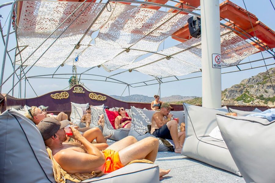 Rhodes: Sunset Cruise with Greek BBQ and Unlimited Drinks - Greek BBQ during the return sailing