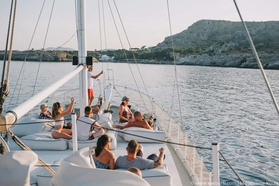 Rhodes: Sunset Cruise with Open Bar, Dinner, & Live Music - Timing, comfort, and the cool evening breeze