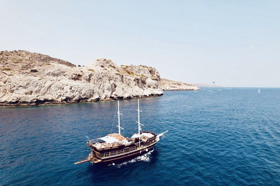Rhodes: Sunset Cruise with Unlimited Aperol, Beer, and Wine - Leaving Mandraki Harbour for the evening