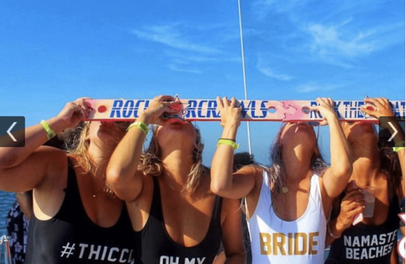 Rockstar Boat Party Cancun - Booze Cruise Cancun (18+) - Jumping into the turquoise water