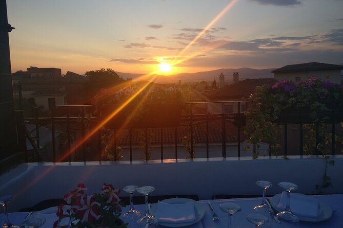 Rooftop Bar Hopping with Local Friends - Second rooftop: a welcome shot and more social energy